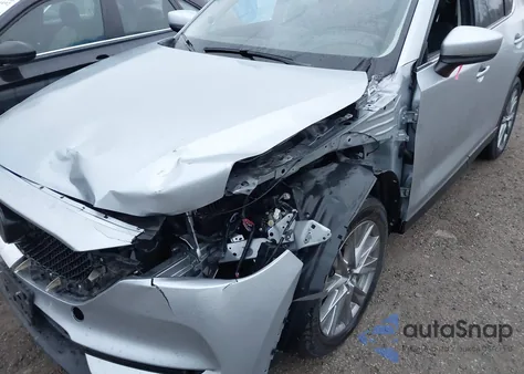 2021 Mazda Cx-5 Grand Touring Reserve z USA, uszkodzony, nr VIN JM3KFBAY9M0434471